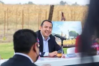 May be an image of 2 people and people standing